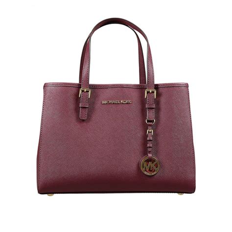 michael michael kors jet set travel md ew tote|michael kors jet set duffle.